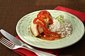Ginger Chicken with Red Bell Peppers and Rice; Fork and Knife