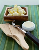 Butter Curling Tools with Butter Curls in a Wooden Bowl
