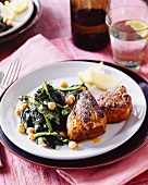 Curried pork chops with spinach and chickpeas