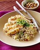 Breaded chicken breast with pineapple and pistachio rice