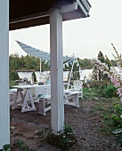 Laid table by a lake