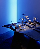 An atmospherically arranged meal with blue light