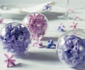 Decorative baubles with flowers inside