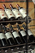 Wine displayed on a glass shelf