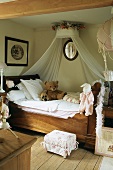 An antique wooden bed in a bedroom in a country house