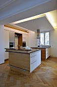 Double central island units in contemporary kitchen