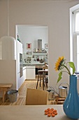 View from dining room into modern kitchen