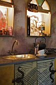 Metal sink in rustic kitchen