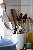 Kitchen utensils in ceramic pot