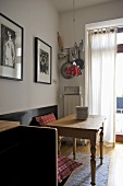 Bench seat and wooden table in modern dining room