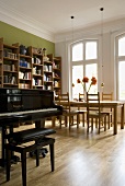 A piano in a living-room-cum-dining-room