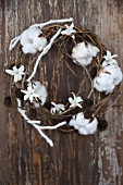 A wreath of alder and cotton with hyacinth flowers