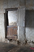 An old bricked up stall door