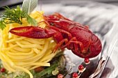 Cooked freshwater crayfish with ribbon pasta