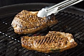 Marinated lamb chops on a barbecue
