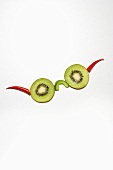 Spectacles made from kiwi fruit slices and chillies