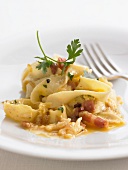 Tagliatelle alla carbonara (pasta with an egg and bacon sauce)