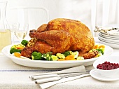 Roast turkey with vegetables and cranberries