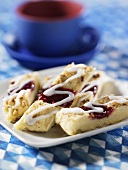 Pecan nut slices with raspberry jam