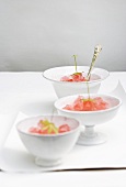 Bowls of woodruff and strawberry jelly
