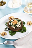 Mushrooms with feta-spinach filling, walnuts and pine nuts