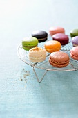 Various macaroons on a wire rack