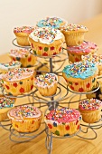 Colourful cupcakes on a cake stand