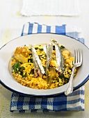 Rice with sardines, spinach, artichokes and cauliflower (Spain)