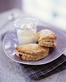 Puff pastries with plum filling and crème double