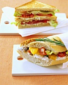 Club sandwich and goat's cheese in baguette