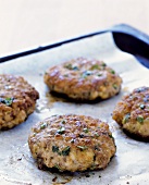 Rissoles on a baking tray