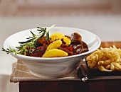 Venison ragout with oranges and home-made noodles