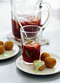 Cheese balls with mint sauce and Sangria