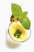Pineapple drink decorated with mint