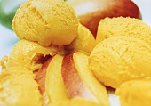 Mango ice cream with mango wedges