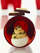 Stuffed egg with green pepper; canapés