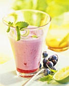 Blueberry buttermilk drink with lime zest