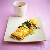 Pancakes with glass noodles, duck breast and spring onions