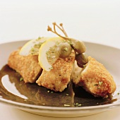 Breaded chicken breast with capers and lemon