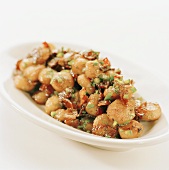 Fried potatoes with bacon and herbs