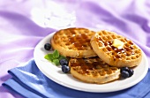 Waffles with blueberries and maple syrup