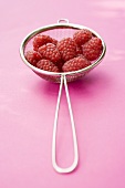 Raspberries in sieve