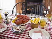 Laid table with lobster (USA)