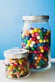 Coloured bubblegum balls and jelly beans in jars