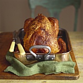 Whole turkey in roasting tin