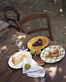 Quark cake, fig tart and apricot tart (a slice of each)
