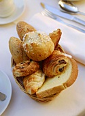 Breakfast bread and pastries in a bread basket