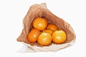 Mandarin oranges in paper bag