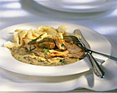 Strips of turkey with mushroom sauce and home-made noodles