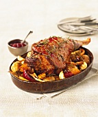 Leg of lamb with rosemary on vegetables